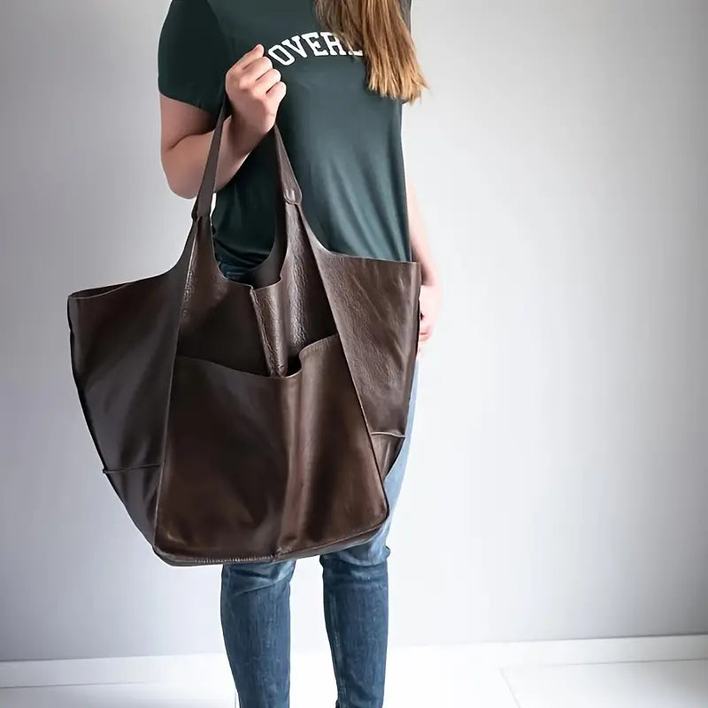 Fashionable Women's Tote Bag, a spacious carryall with secure closure for all your needs.