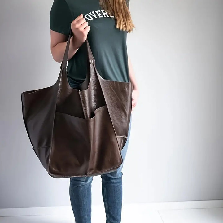 Fashionable Women's Tote Bag, a spacious carryall with secure closure for all your needs.