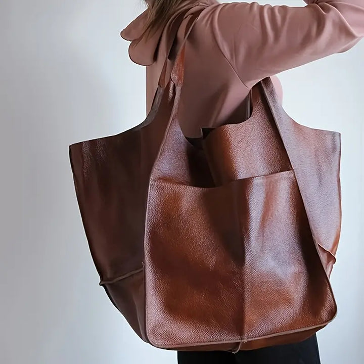 Stylish Women's Grand Carryall Tote Bag, a chic accessory & spacious handbag for any occasion.