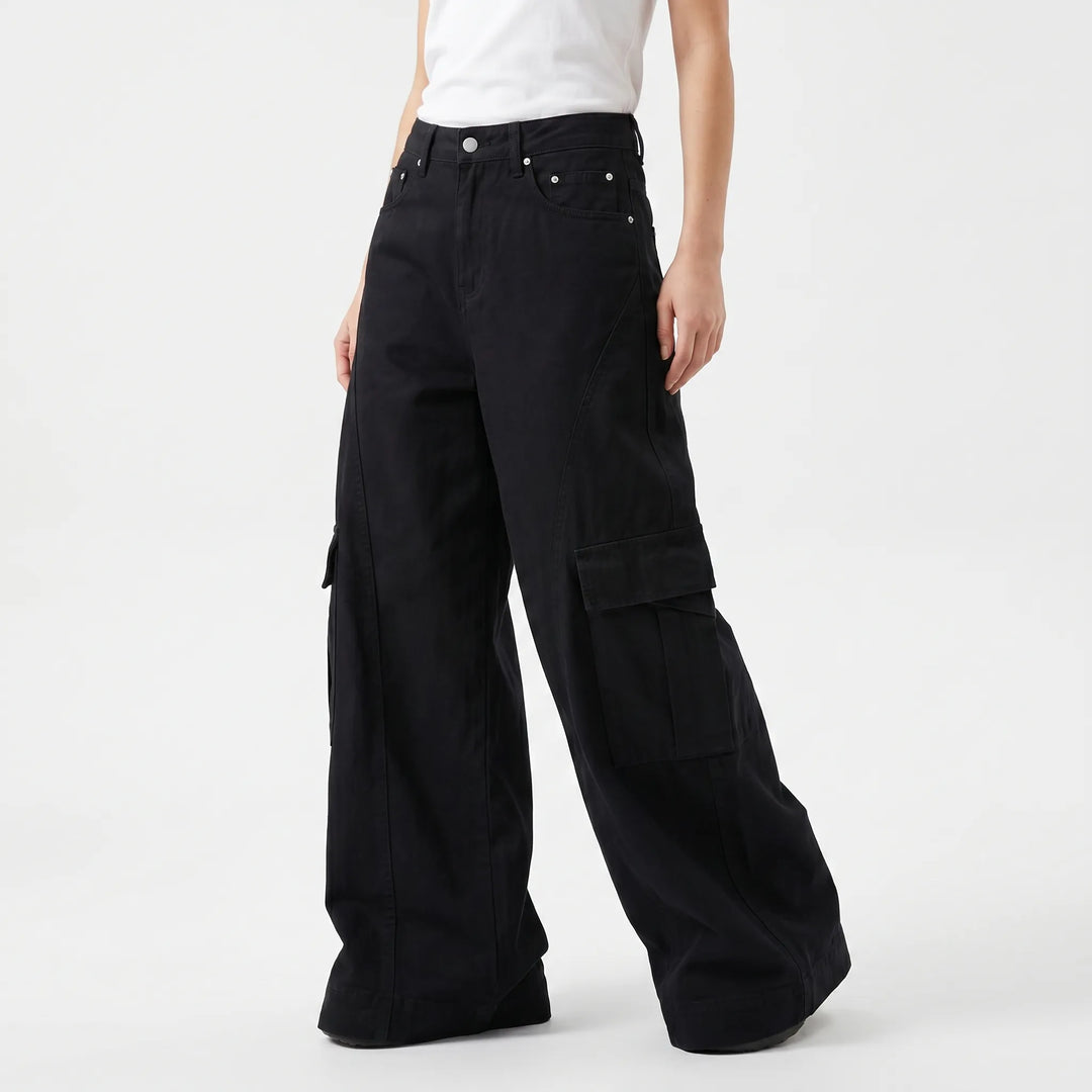 Fashionable brown high-rise wide-leg baggy pants for women. Oversized, comfortable, and perfect for a casual streetwear look.