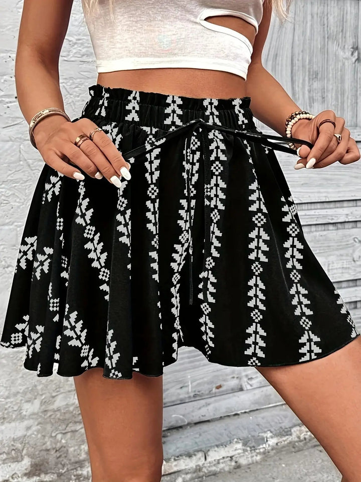 Bohemian high-waisted shorts for women, with a relaxed flare fit and unique geometric pattern.