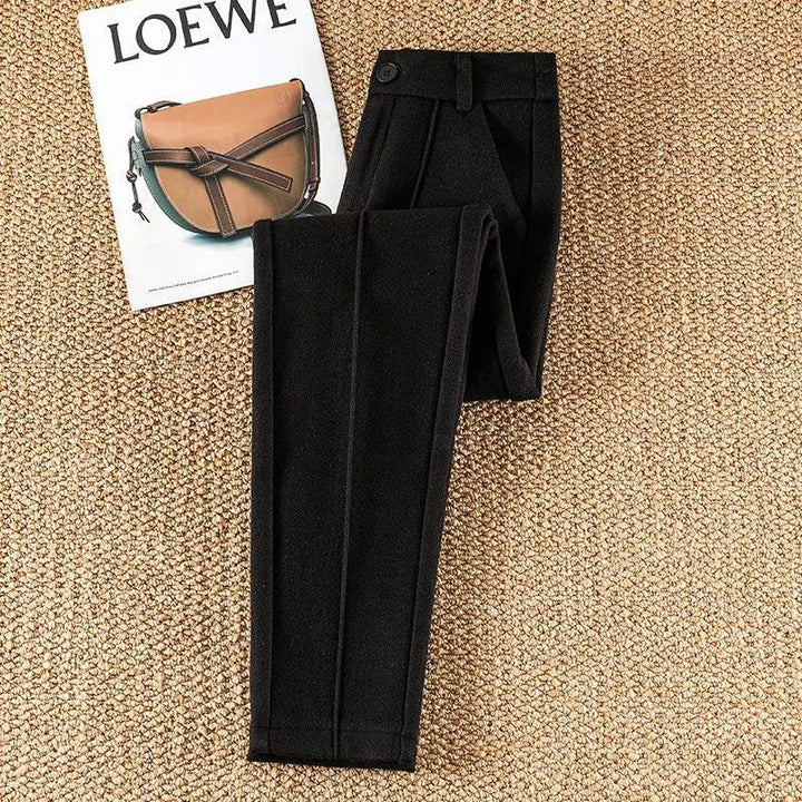 Versatile women's high-waisted tailored herringbone pants, suitable for officewear or dressy events.