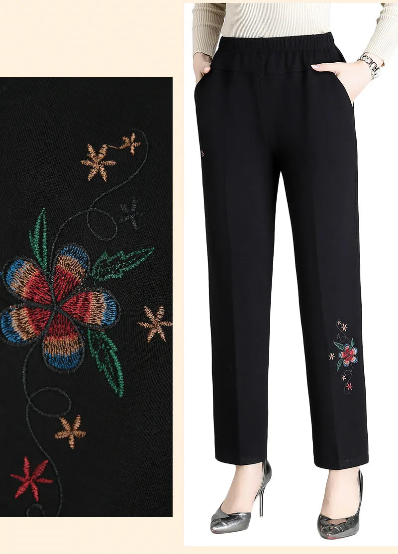 Warm women's plus size embroidered high-waisted pants, a stylish choice for winter fashion.