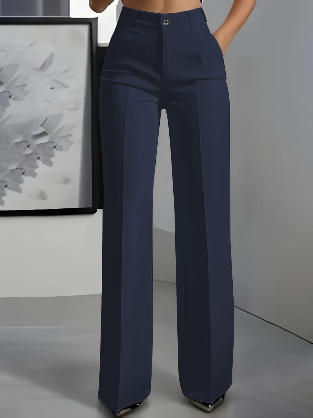 Women's high-waisted wide-leg trousers, structured fit for office or casual wear.