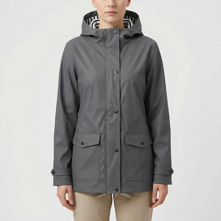 Women's waterproof hiking jacket, breathable & comfortable for active outdoor wear.