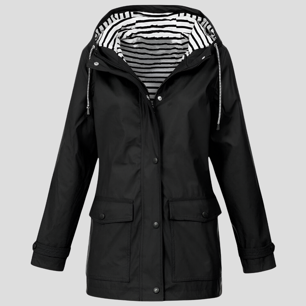 Lightweight women's windproof and waterproof jacket with hood. Ideal for hiking, travel, and casual outdoor wear.