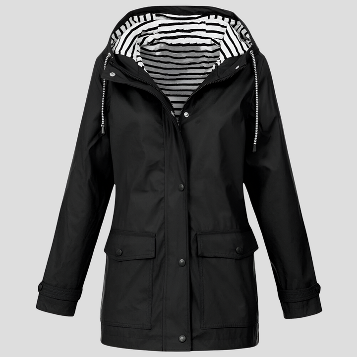 Lightweight women's windproof and waterproof jacket with hood. Ideal for hiking, travel, and casual outdoor wear.
