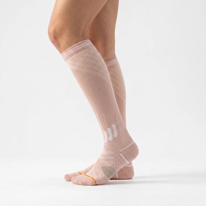 Soft, breathable women's knee-high comfort socks with graduated compression for daily support.