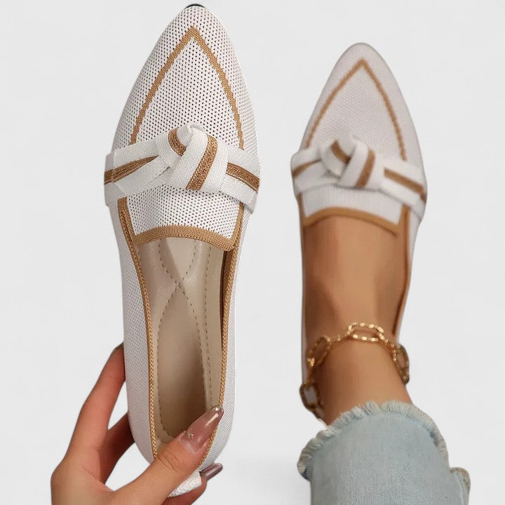 Women's knot-front pointed-toe flat loafers in a classic style, perfect for elegant everyday wear.