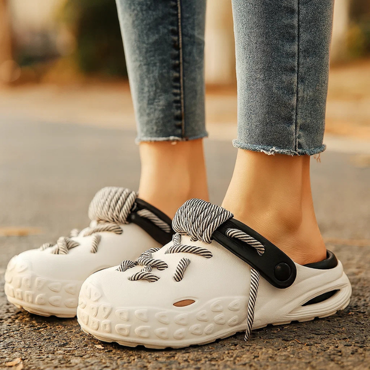 Women's fashionable laced clogs, breathable design, ultimate comfort, lightweight casual slides.