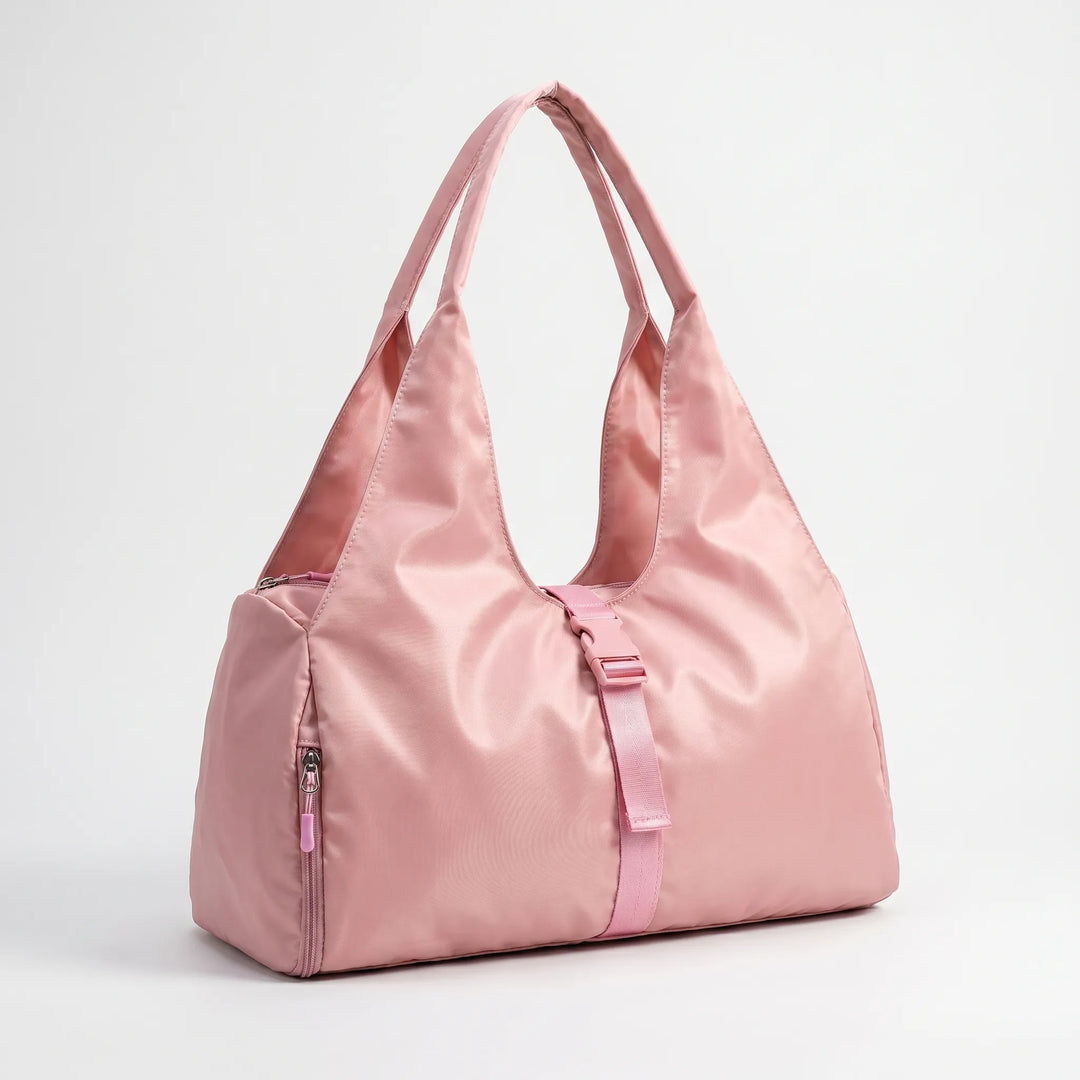 Spacious women's sports duffel bag, ideal gym bag for active women. Large capacity fitness & travel tote.