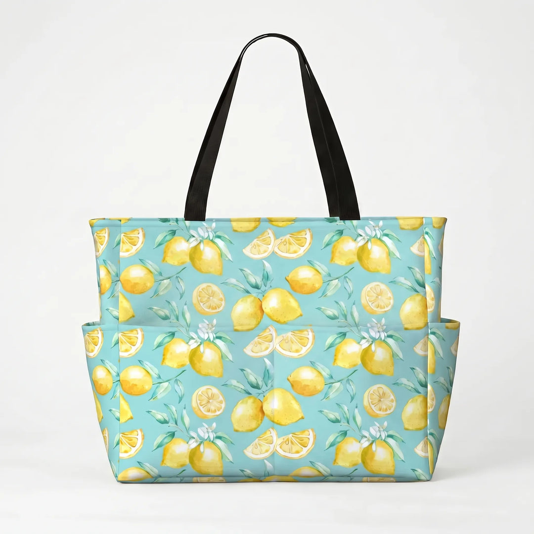 Front view of women's large tropical lemon print beach tote bag, showcasing spacious design. Summer essential.