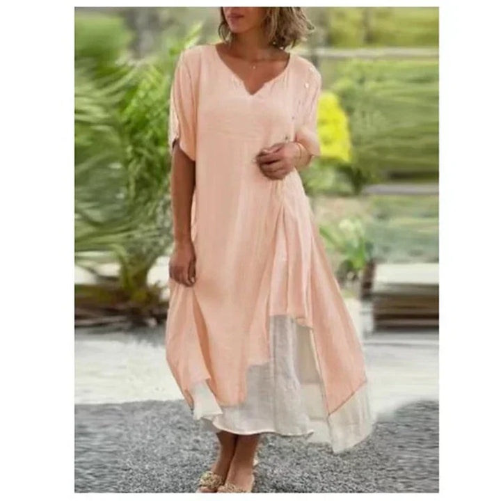 Chic women's layered midi dress featuring short sleeves and V-neck, embodying casual summer elegance.