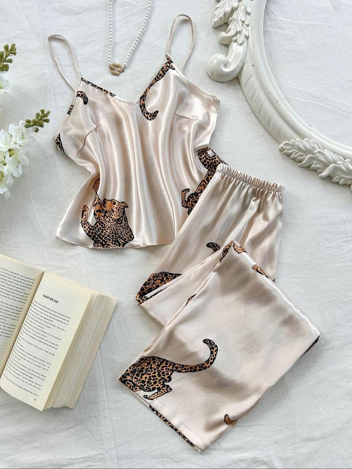 Women's leopard print silk satin pajama set. Luxurious and comfortable animal print sleepwear.