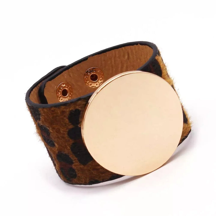 Versatile women's adjustable leopard leather wrap bracelet. Trendy animal print fashion accessory.