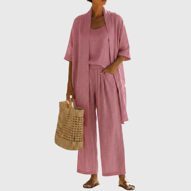 Model wearing a women's casual elegant three-piece set, showcasing its relaxed fit & summer style. Vacation ready.
