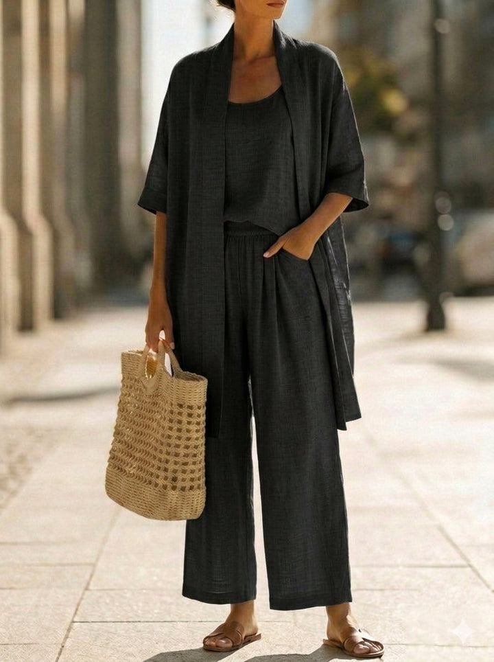 Dynamic shot of a women's breathable three-piece set, perfect for casual elegant summer wear & effortless style.