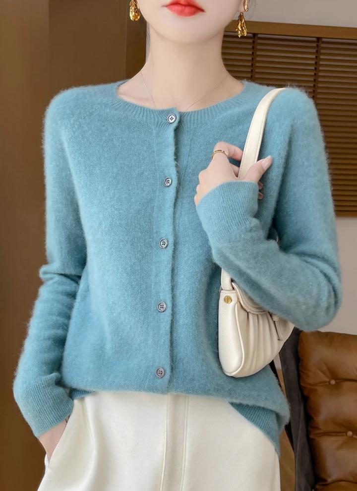 Soft knit women's button-down cardigan in a classic crew neck style, lightweight & versatile for everyday fashion.