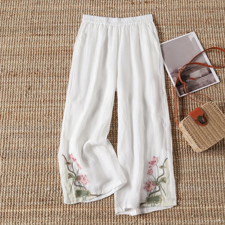 Stylish women's floral print cotton blend trousers, lightweight and perfect for summer's casual fashion.