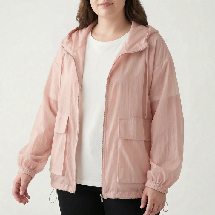 Breathable women's lightweight hooded jacket for hiking, running, and active outdoor recreation.
