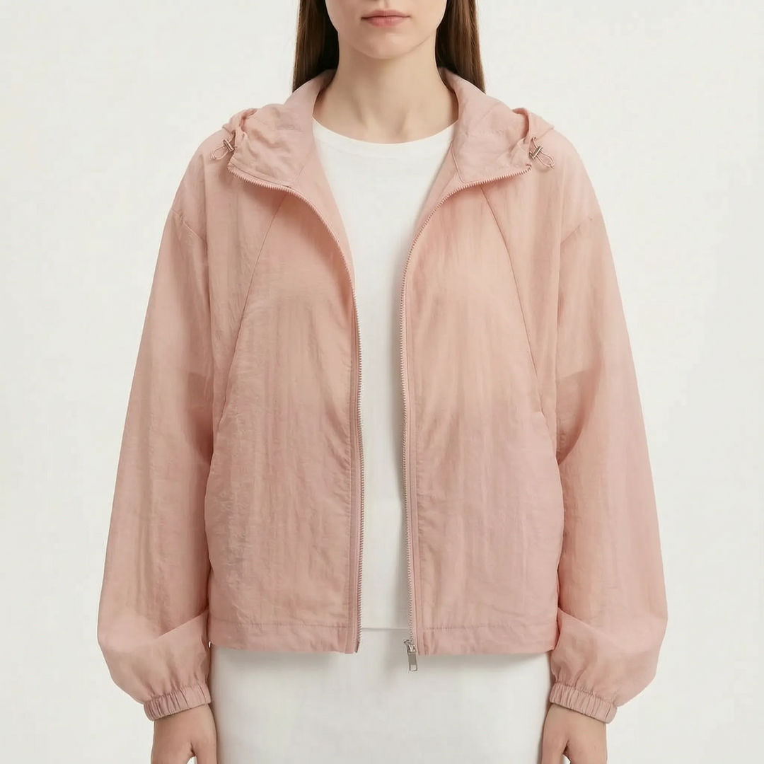 Stylish women's lightweight hooded windbreaker, excellent outerwear for summer hikes and breezy spring evenings.