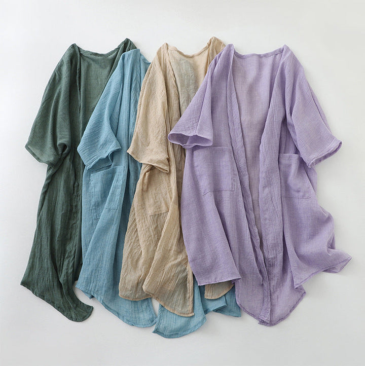All-season women's open-front cardigan with pockets, a versatile layering piece for any look.