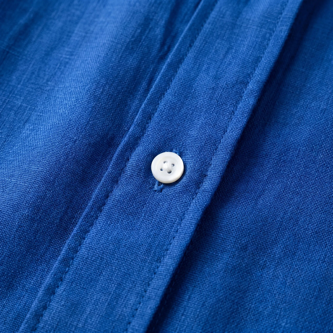 Solid color women's loose fit top: lightweight, oversized summer blouse with button front & long sleeves.