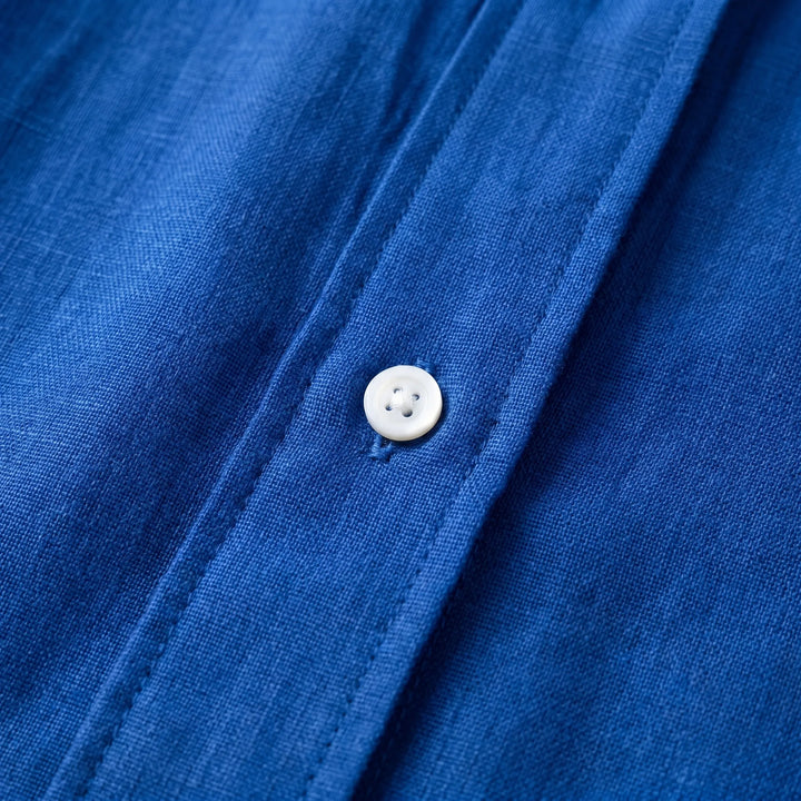 Solid color women's loose fit top: lightweight, oversized summer blouse with button front & long sleeves.