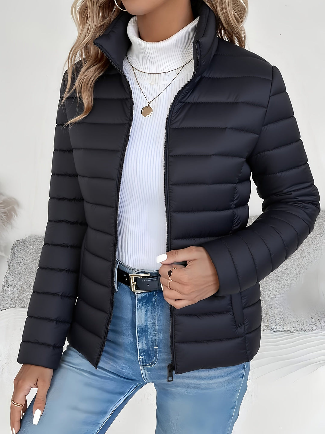 Slim-fit women's quilted jacket with a zip closure. Ideal casual everyday outerwear for fall & mild winter.