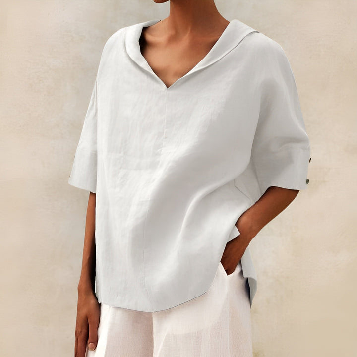 Women's lightweight short sleeve blouse. Everyday comfort top for casual summer style. Relaxed fit, chic ladies' wear.