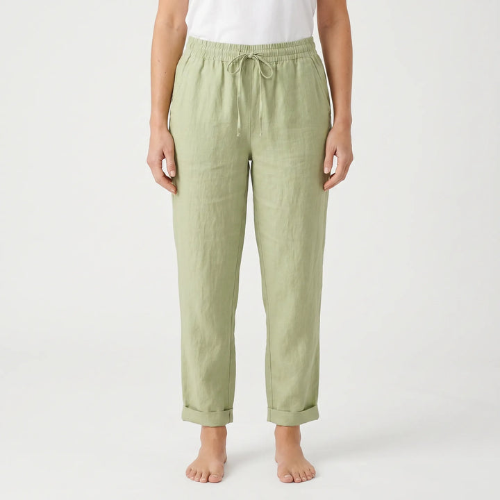 Breezy women's tapered leg summer trousers with comfortable drawstring waist, ideal for vacation wear.
