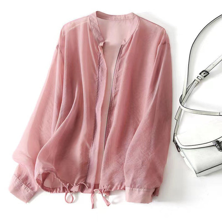 Comfortable pink women's lightweight jacket for effortless summer style. Casual, versatile outerwear with relaxed fit.