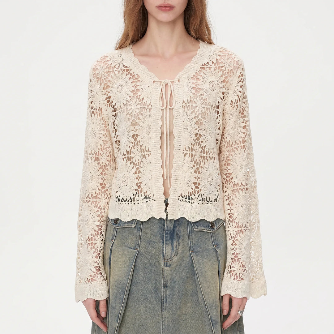 Elegant women's lilac openwork floral cardigan. Lightweight, breathable, with delicate bell sleeves & tie front.