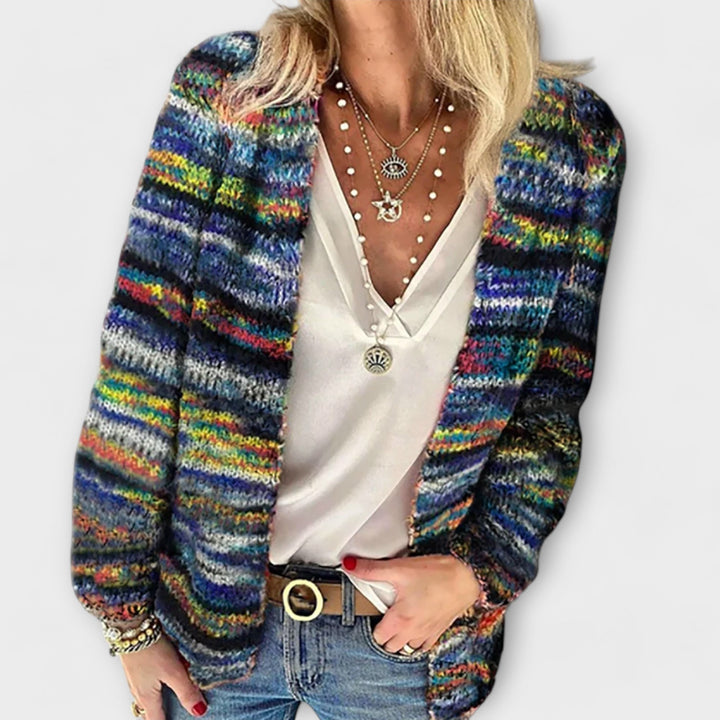 Cozy knit women's open-front cardigan in a vibrant, lively pattern. Comfortable & relaxed fit for stylish casual wear.