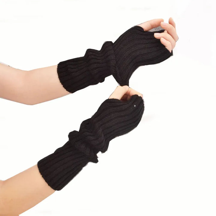 Stylish arm warmers: Women's long fingerless knitted gloves for fashion and comfort in winter.