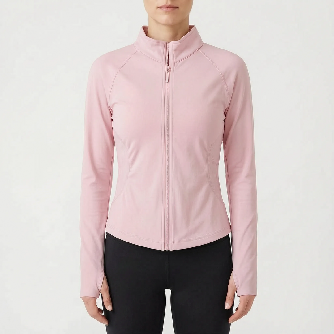 Dynamic shot of a woman wearing the long-sleeve active workout jacket during exercise.