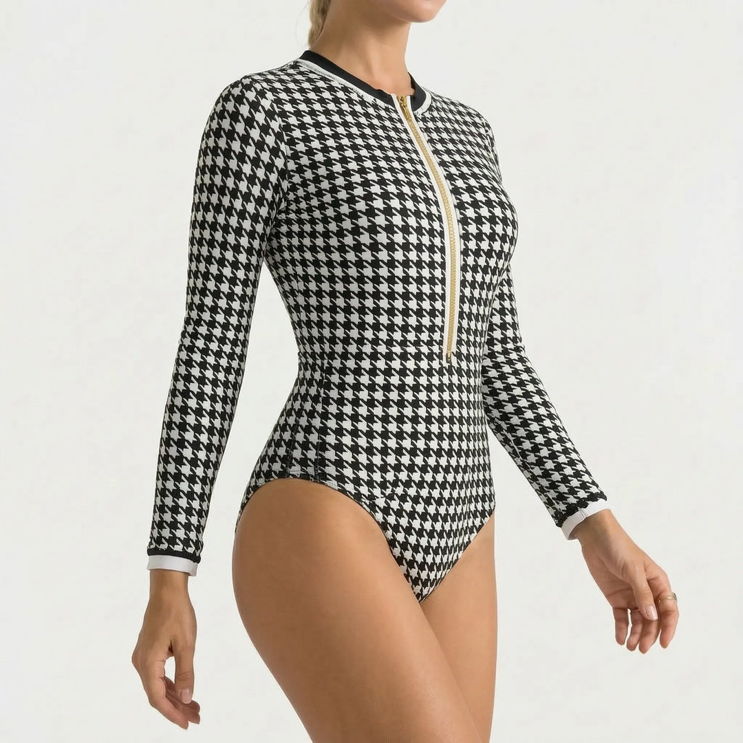 Durable women's long-sleeve one-piece swimwear, zipper front, excellent for beach & board sports.