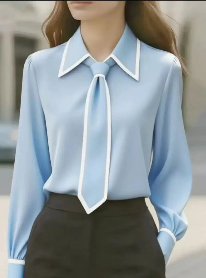 Versatile women's long sleeve tie neck blouse with contrast trim. Smart casual or professional work top.