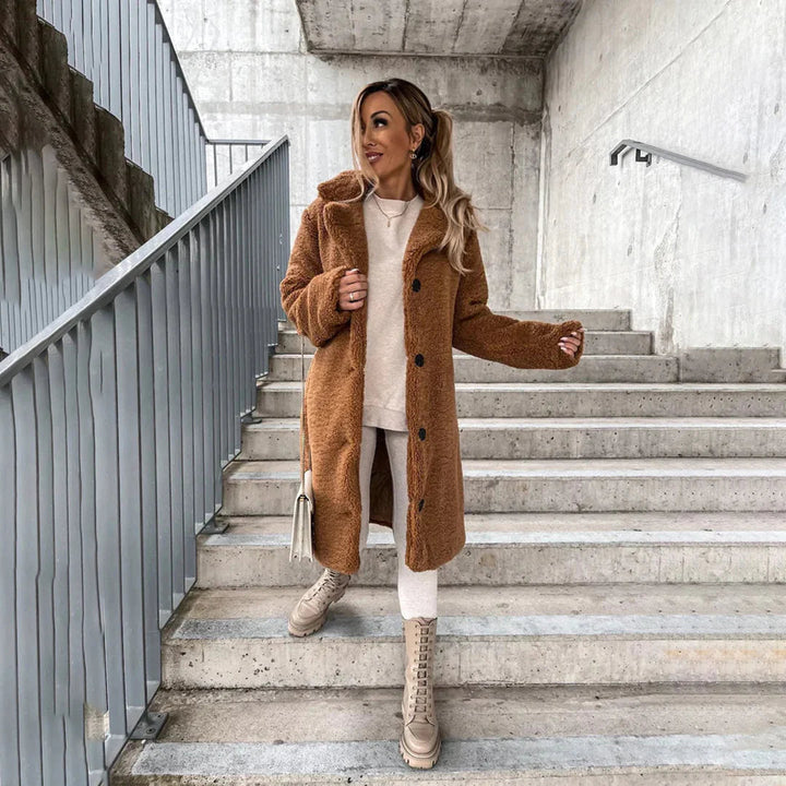 Warm women's long teddy coat, perfect winter jacket. Cozy fashion outerwear for stylish women.