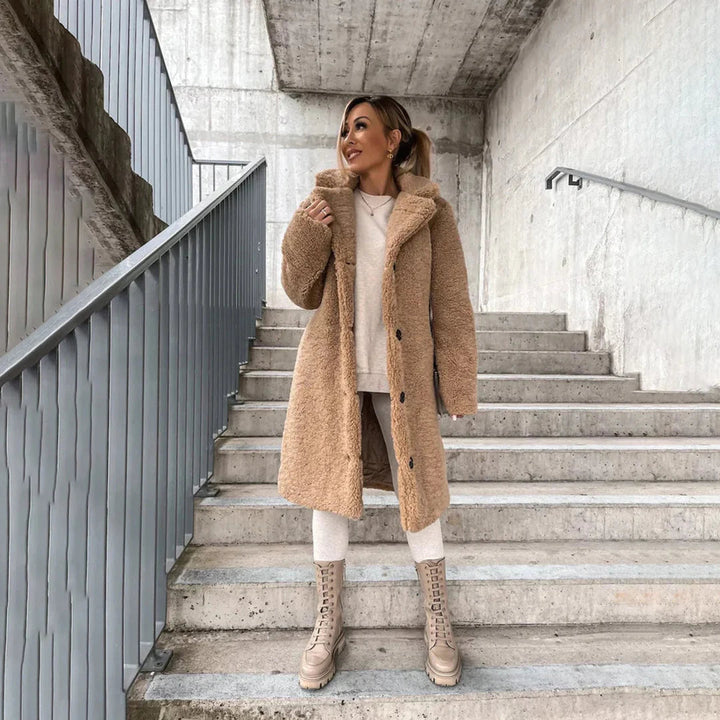 Stylish women's long teddy coat. Cozy, soft, and warm outerwear for autumn & winter fashion. Relaxed fit.