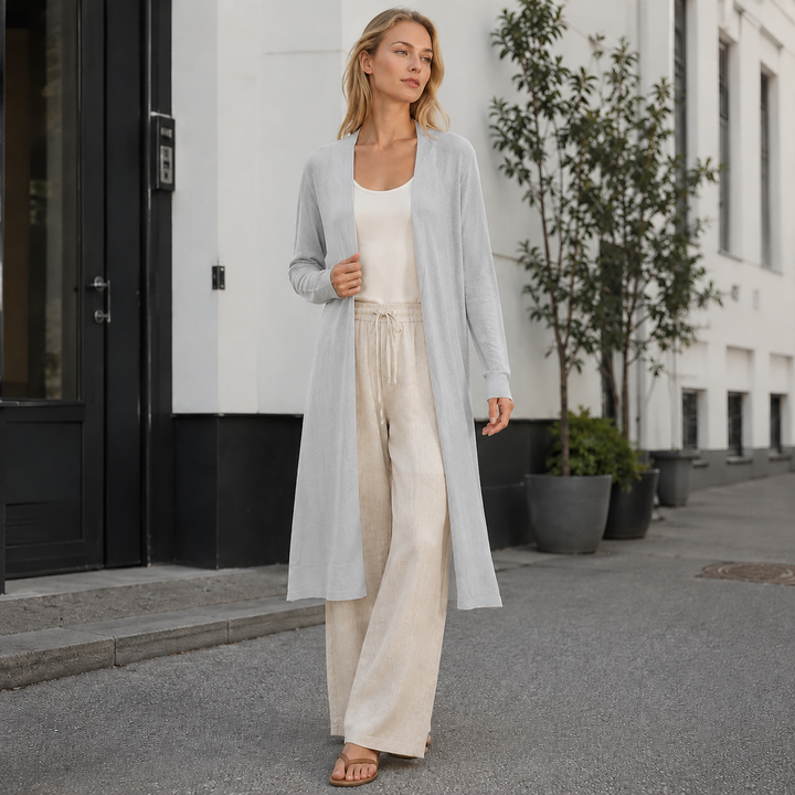 Long, comfortable knit cardigan for women, perfect for versatile layering and warmth.