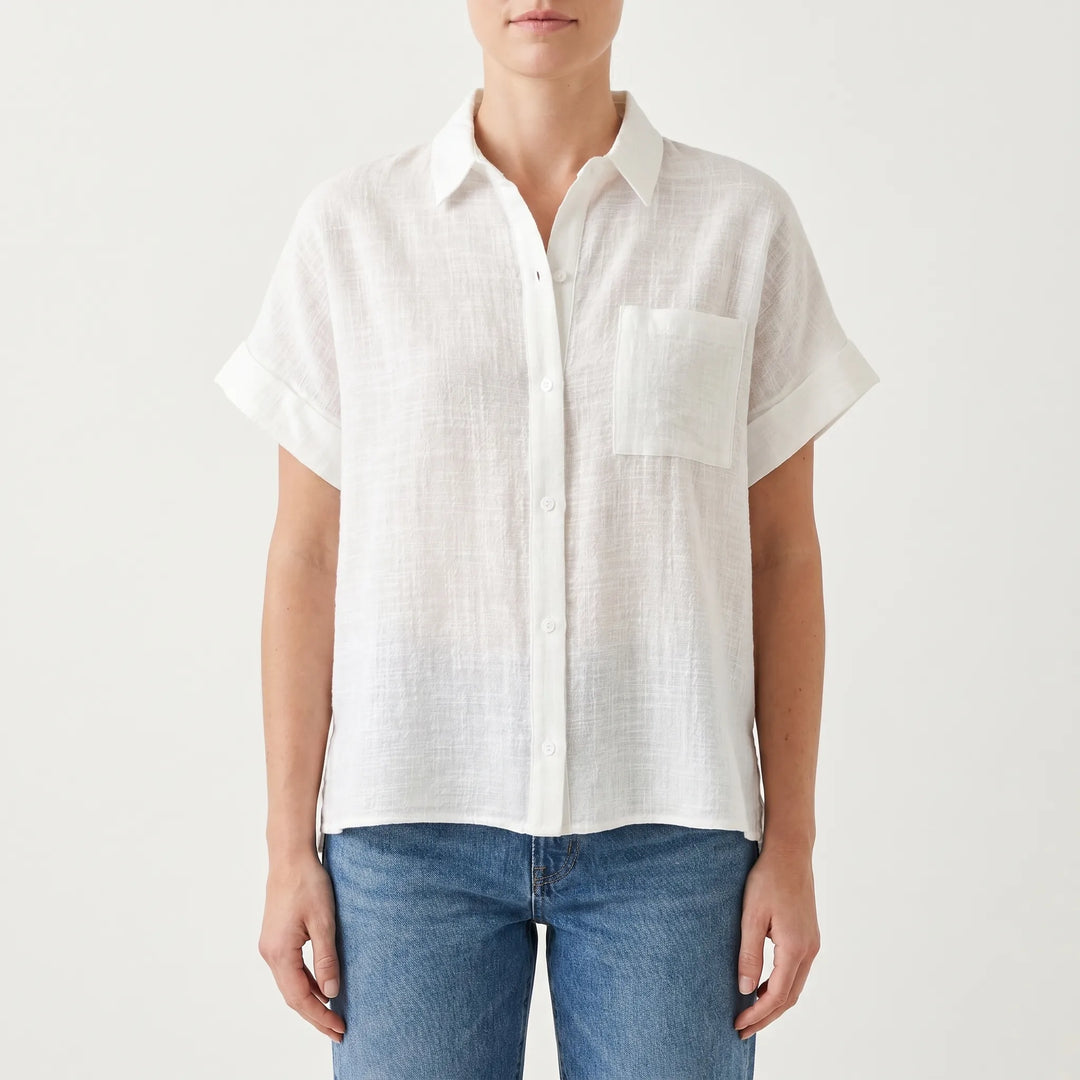 Versatile women's short sleeve button-down shirt, loose fit, perfect for relaxed everyday outfits.
