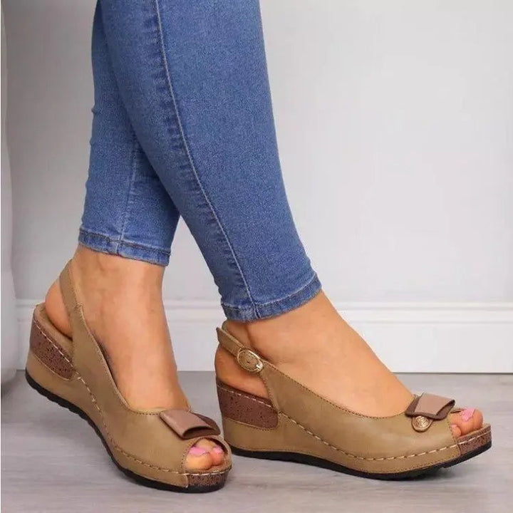 Comfortable women's summer shoes: low wedge peep toe slingback sandals with adjustable strap.