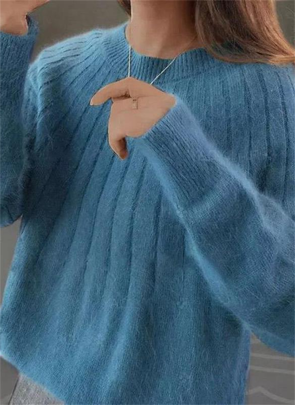 Women's luxurious soft cashmere knit sweater, perfect for warm, comfortable winter style and elegant wear.