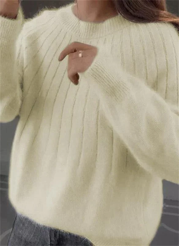 Elegant women's long-sleeve knit sweater, crafted from soft cashmere for ultimate warmth and comfortable style.