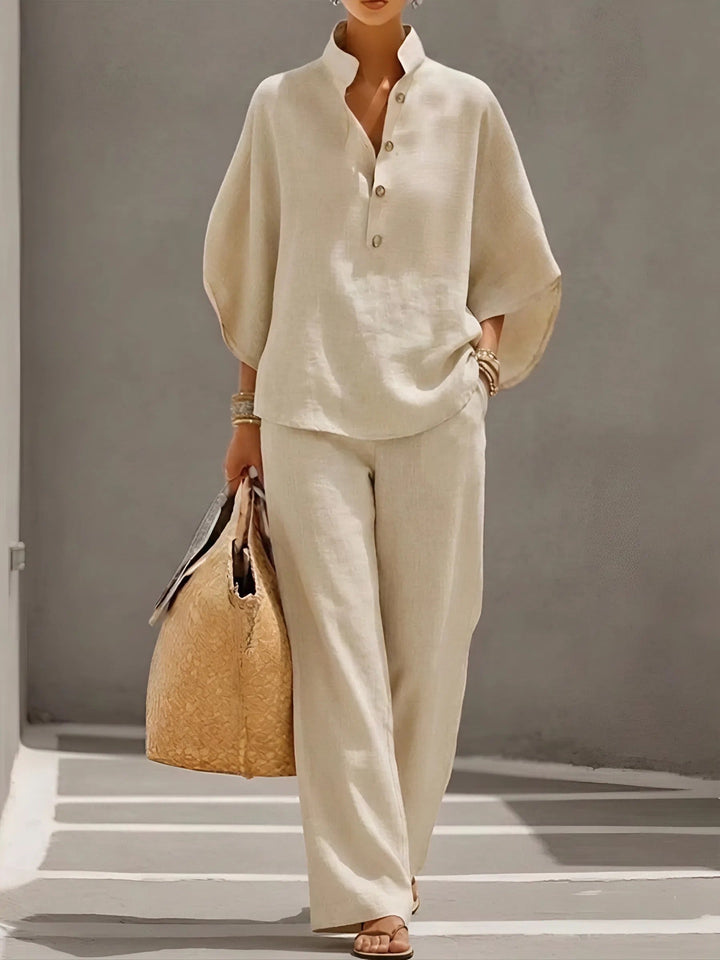 Breathable casual women's set: mandarin collar top paired with flowy wide-leg pants.