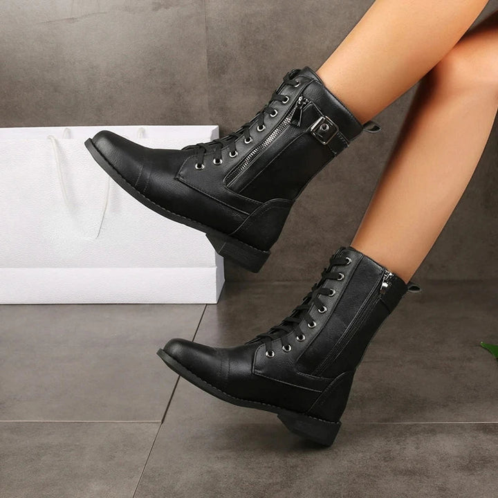 Stylish women's Mason mid-calf boots. Edgy design with durable construction, ideal for fall and winter fashion.