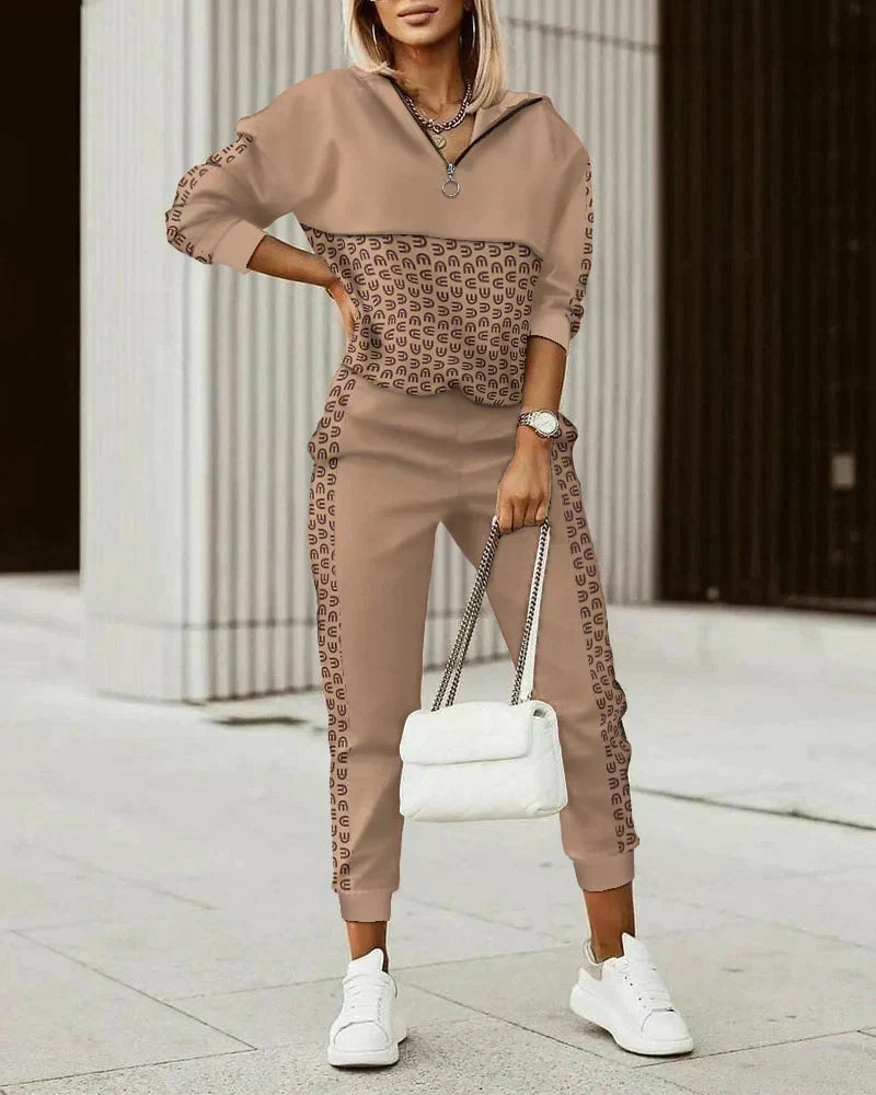 Woman in stylish modern Mira tracksuit, perfect for comfortable activewear or casual everyday outfit.