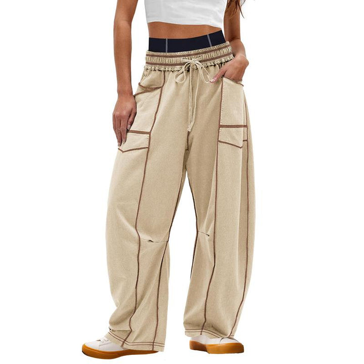 Stylish women's cargo pants, modern barrel leg design, ideal for streetwear and casual outfits.