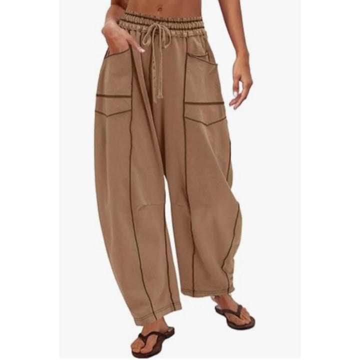 Relaxed fit women's barrel pants, modern utility style with functional pockets for everyday comfort.